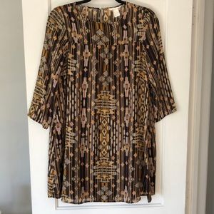 H&M oversized size 4 swing dress.‎ Beautiful graphics. Aztec appearance. NWOT.